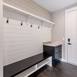 The New Shaker Wet Room uses maple wood and a java finish. Cabinets crafted in Michigan since 1958.