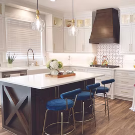 The Brookhaven style kitchen is crafted with Maple wood with a white and Kodiak finish. Cabinets crafted in Michigan since 1958.
