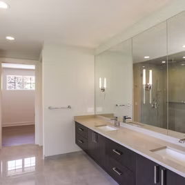 The Midwest bathroom from Lafata Cabinets uses maple wood with a mocha finish. Cabinets crafted in Michigan since 1958.