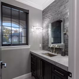 The  Fallbrook bathroom is crafted with Maple wood with a shadow finish.
